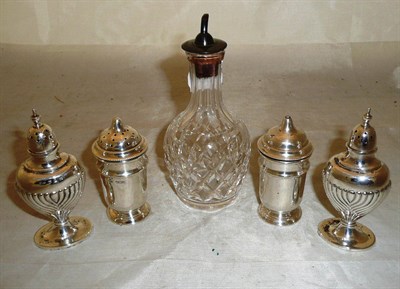 Lot 424 - Four silver condiments and a silver mounted bottle