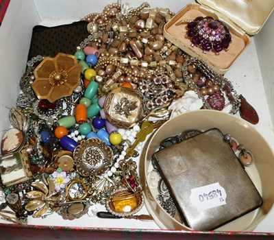 Lot 437 - A box of silver and costume jewellery, including a silver cigarette case, charms, beads,...