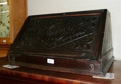 Lot 501 - An 18th century carved oak desk top