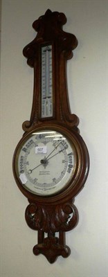 Lot 507 - An oak aneroid barometer