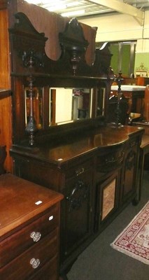 Lot 529 - A late Victorian walnut carved mirror back sideboard