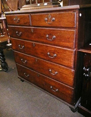 Lot 552 - Large Georgian oak five height chest of drawers