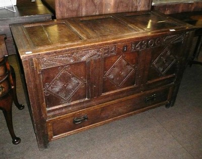 Lot 570 - Carved oak mule chest