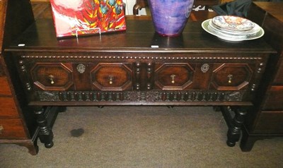 Lot 577 - A carved oak dresser base