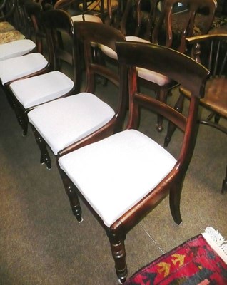 Lot 600 - Three Victorian mahogany dining chairs and two others with carved backs