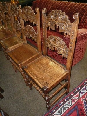 Lot 607 - Six South Yorkshire/North Derbyshire oak dining chairs, each with crescent shape splats above...