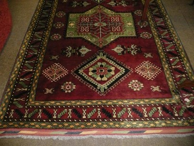 Lot 609 - Afghan rug North West Frontier Province, The fox brown field centred by a pistachio medallion...