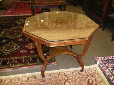 Lot 610 - An Edwardian simulated rosewood octagonal centre table