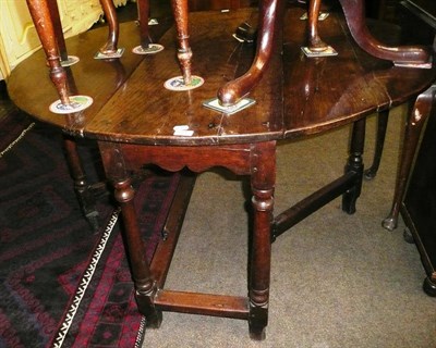 Lot 614 - Early 19th century oak drop leaf table