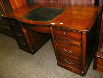 Lot 625 - Modern pedestal desk with green leather top and inlaid drawer to the front