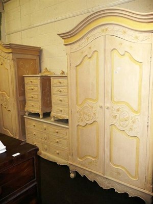 Lot 648 - Modern cream painted French style bedroom suite of two double wardrobes, dressing table and two...