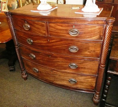 Lot 659 - An early 19th century mahogany chest of drawers, bow front