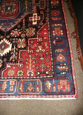 Lot 673 - Joshan rug West Persia, The field with sky blue medallion framed by spandrels and compartmentalised