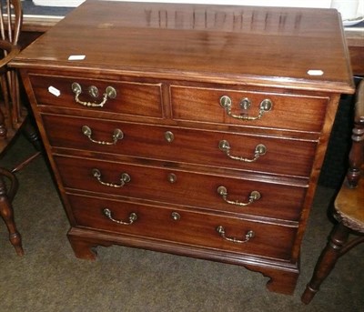 Lot 675 - A Georgian mahogany four height chest of drawers