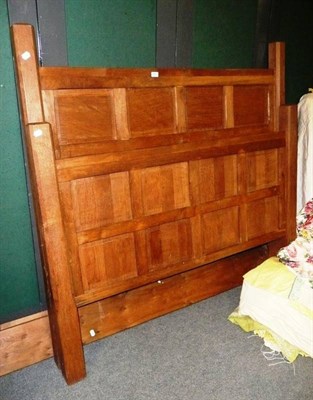 Lot 693 - An oak panelled double bedstead