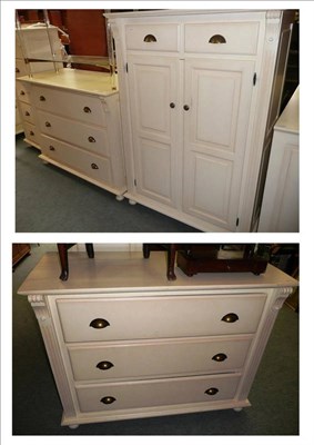 Lot 713 - Two modern cream painted chests of three drawers and a matching cupboard