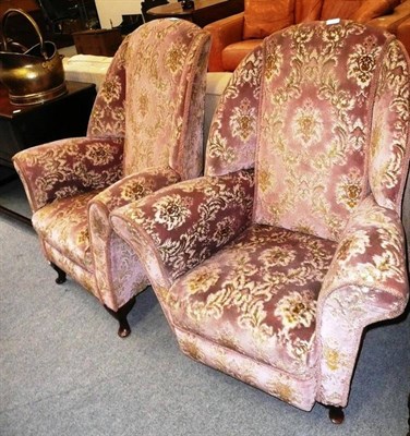 Lot 796 - A pair of pink upholstered armchairs