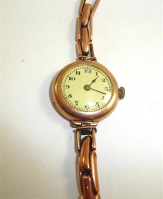 Lot 7 - A lady's gold wristwatch with expanding bracelet (a.f.) and spare expanding links