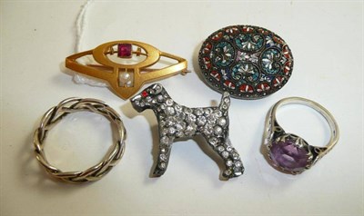 Lot 51 - A German Jugendstil brooch, marked 'Schutz', a silver band ring, a paste dog brooch, a ring and...