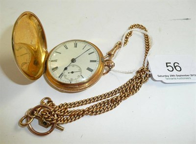 Lot 56 - An 18ct gold pocket watch with yellow metal chain