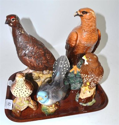 Lot 62 - Two Royal Doulton birds and three Beswick birds