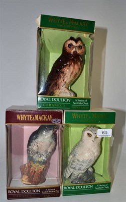 Lot 63 - Three Royal Doulton birds 'Falcon', 'Short Eared Owl' and a 'Snowy Owl', boxed
