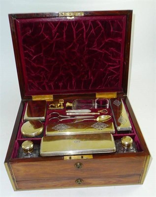 Lot 69 - A composite George IV and William IV silver gilt travelling dressing table set, Thomas...