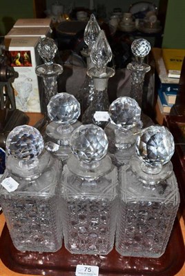 Lot 75 - Three matching decanters, two pairs of decanters, two other single decanters and a Tantalus...