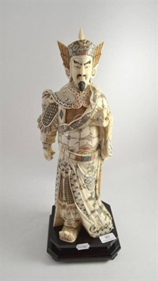 Lot 90 - Carved bone figure of a deity