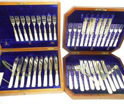 Lot 110 - Two sets of fish knives and forks