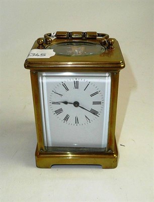 Lot 123 - French brass carriage clock and key