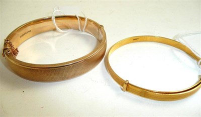 Lot 158 - Two 9ct gold bangles