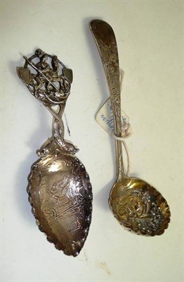 Lot 174 - A silver sifter spoon and a Dutch spoon