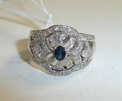 Lot 183 - An 18ct white gold sapphire and diamond ring