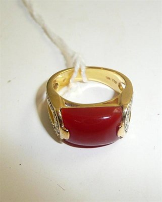 Lot 193 - A cornelian and diamond ring stamped '18K' and '750'