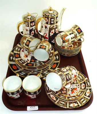 Lot 204 - Royal Crown Derby coffee pot, milk jug, two tea plates, two cups and saucers and Crown Derby...