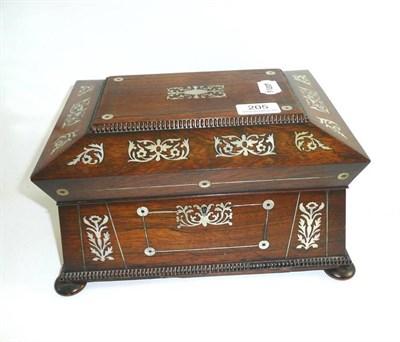 Lot 205 - A 19th century rosewood sewing casket with mother of pearl inlay