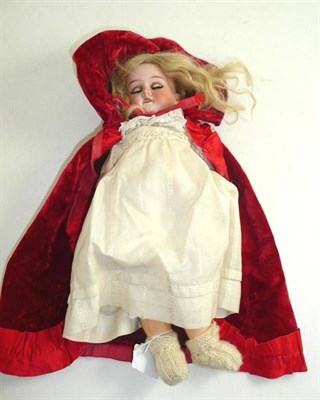 Lot 211 - Armand Marseille '390' bisque socket head doll, with a red velvet cape