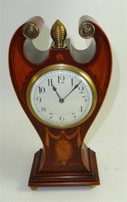 Lot 219 - An Edwardian inlaid mantel clock