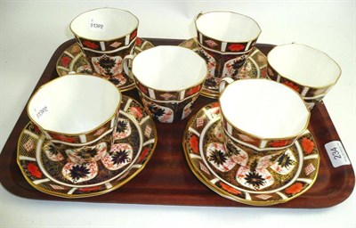 Lot 234 - Six Royal Crown Derby 1128 Imari breakfast cups and saucers (one cup with hairline)