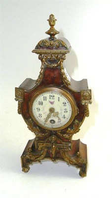 Lot 245 - A French brass mounted walnut small mantel clock