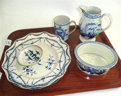 Lot 246 - A collection of late 18th century blue and white pearlware including four dishes, jug, mug and...