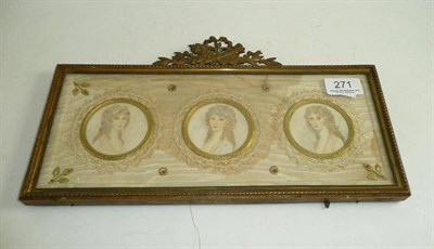 Lot 271 - Three portrait miniatures on ivory of a young lady, collectively mounted in a gilt frame