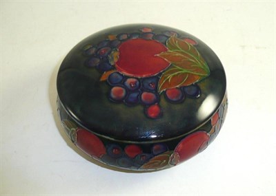 Lot 274 - A William Moorcroft Pomegranate pattern bowl and cover