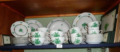 Lot 286 - Herend green floral and gilt decorated dinner and tea service and similar table mats