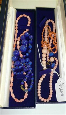 Lot 328 - Coral necklaces, a lapis lazuli necklace etc