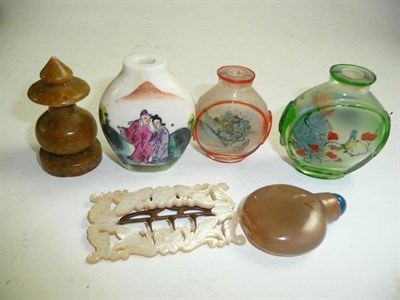 Lot 333 - Four Chinese snuff bottles, finial and mother of pearl buckle (a.f.)