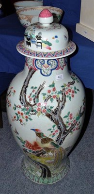 Lot 422 - Large Chinese famille rose vase decorated with birds amongst foliage