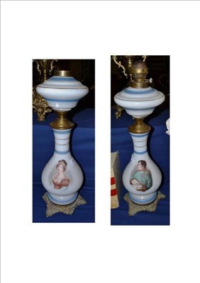 Lot 424 - Pair of glass oil lamps