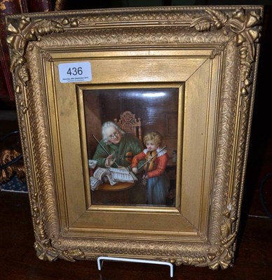 Lot 436 - A German porcelain plaque depicting a young boy having a violin lesson